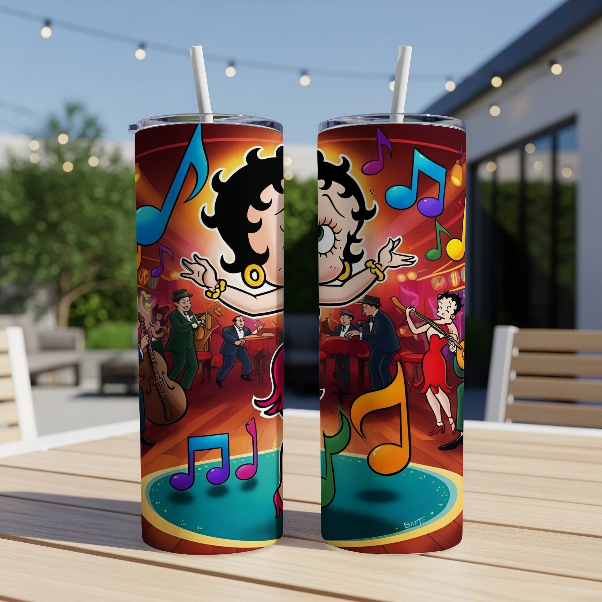 Betty Boop dancing with musical notes and band on a tumbler.
