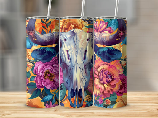 Bull skull with colorful flowers on a tall tumbler.