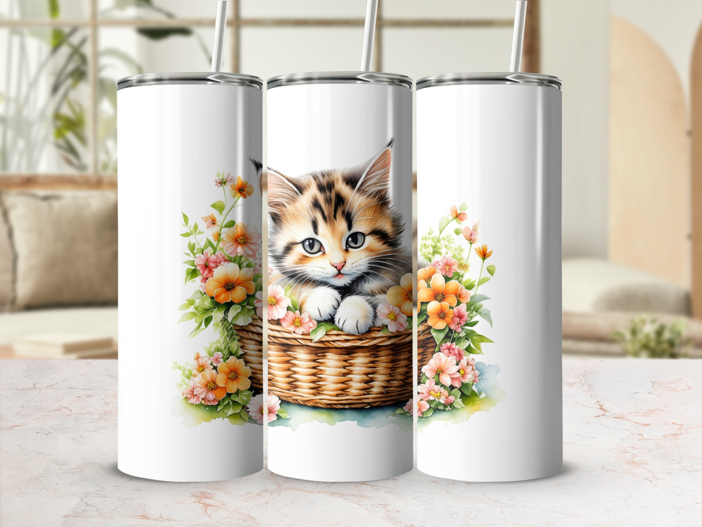 Three tumblers featuring a kitten in a basket surrounded by flowers.