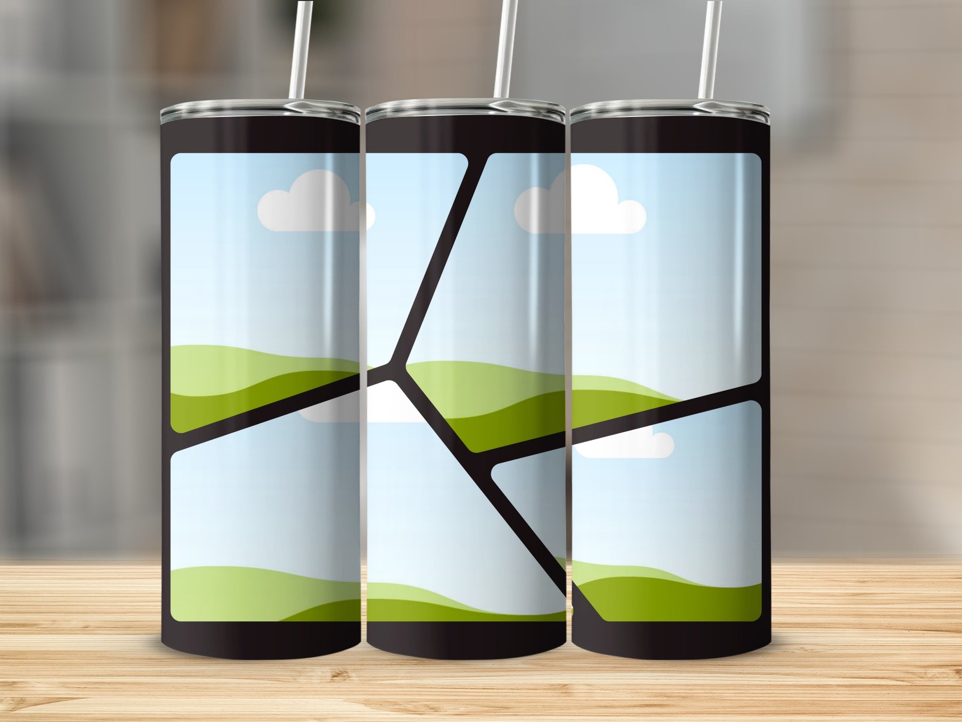 Three tumblers with a segmented landscape design and white straws.