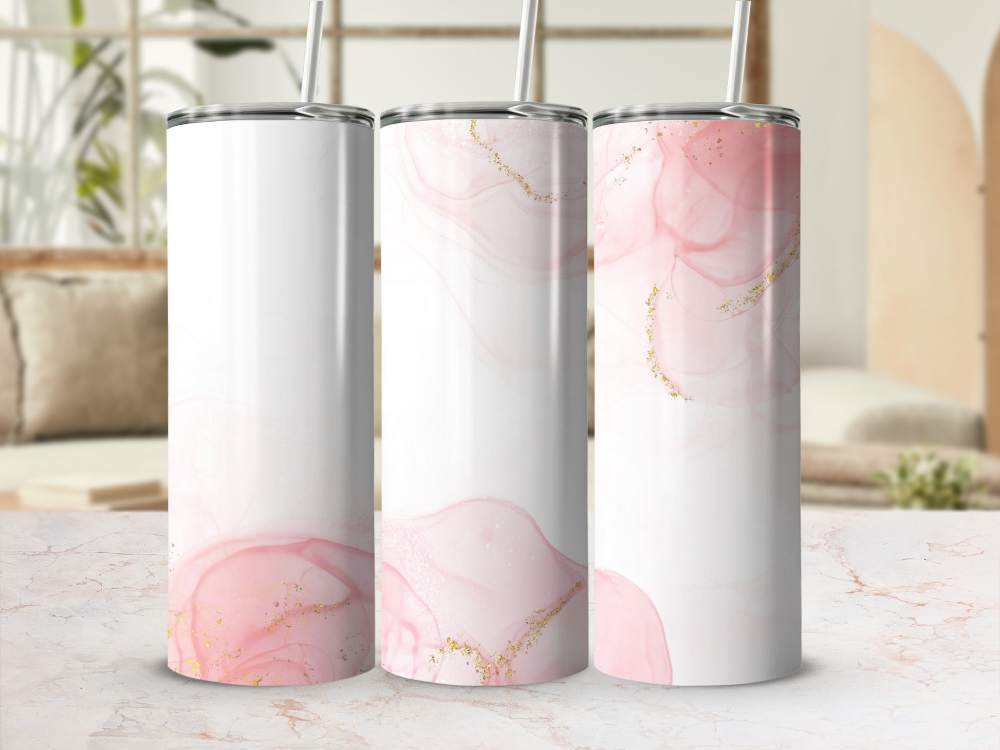 Three white tumblers with pink marble and gold glitter design.