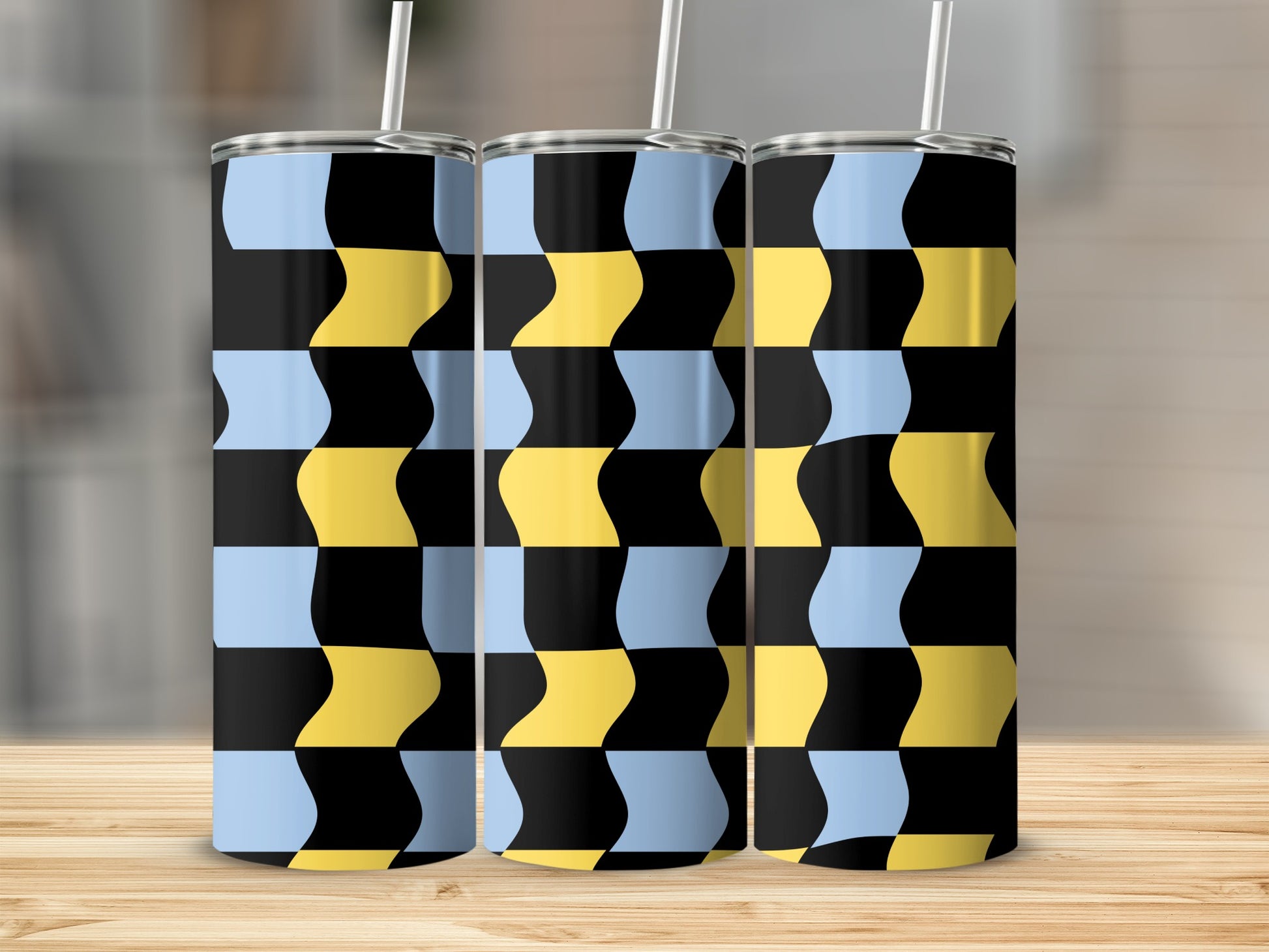 Three tumblers with a black, yellow, and blue checkered wavy pattern.