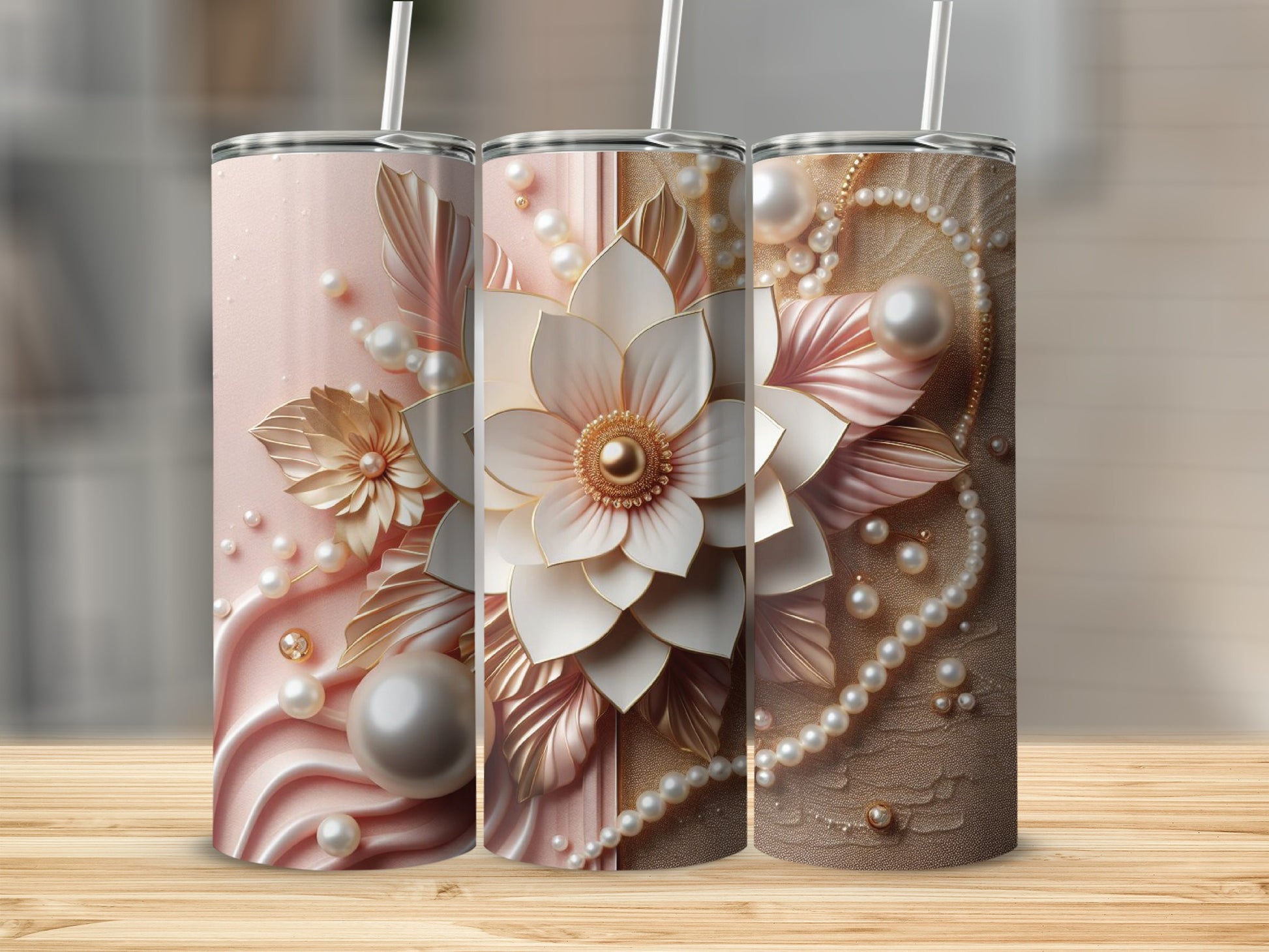 Three tumblers with floral and pearl embellishments in pink and gold.