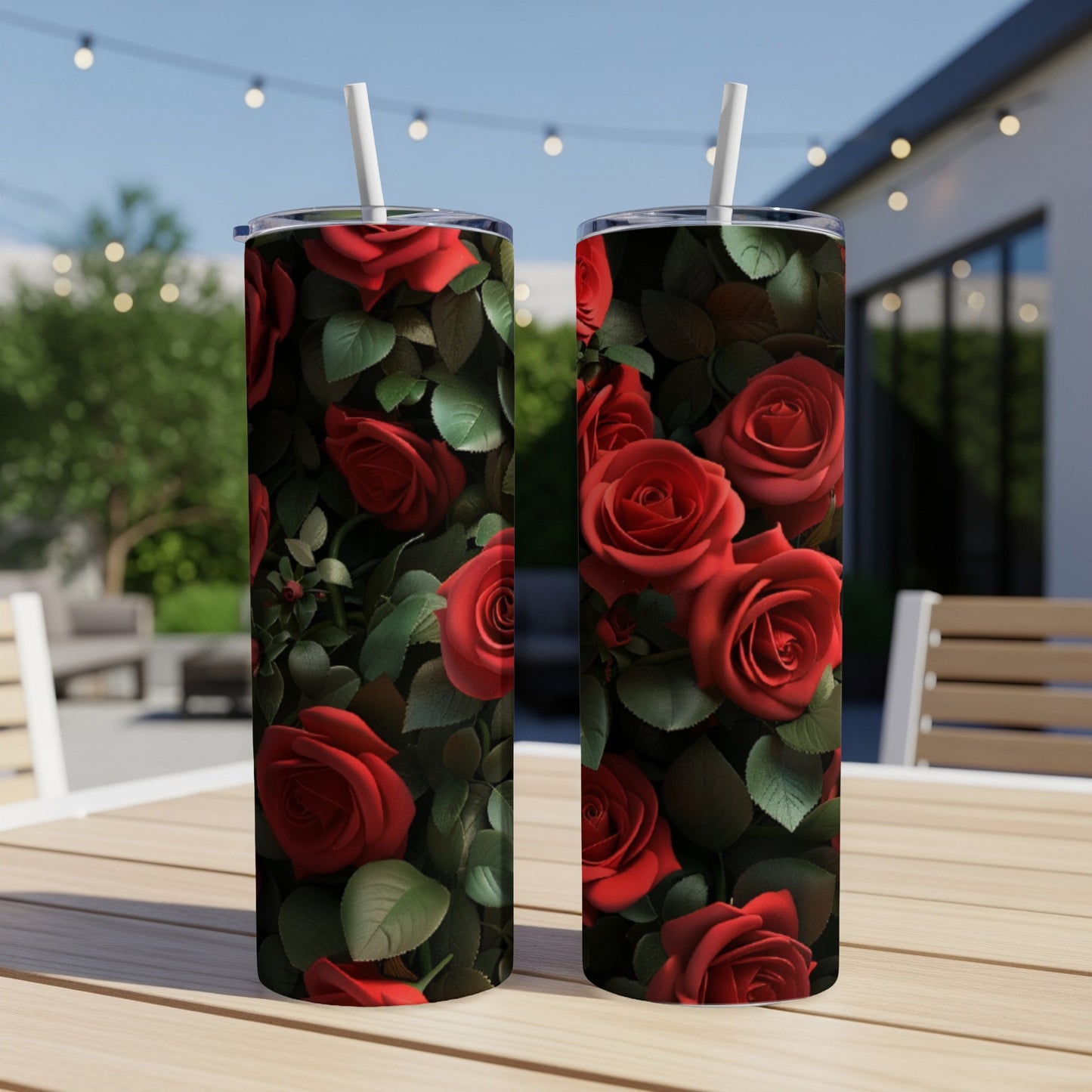 Two tall tumblers with red roses and green leaves design.