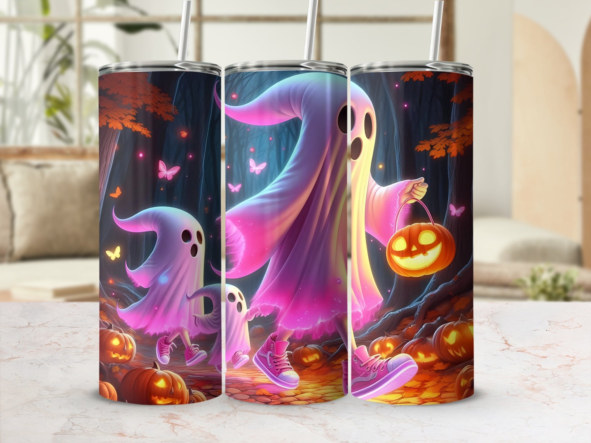 Three tumblers feature a spooky forest scene with glowing pumpkins and pink ghosts.