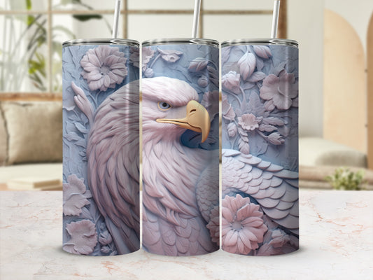 Three light blue tumblers with embossed eagle and floral designs.