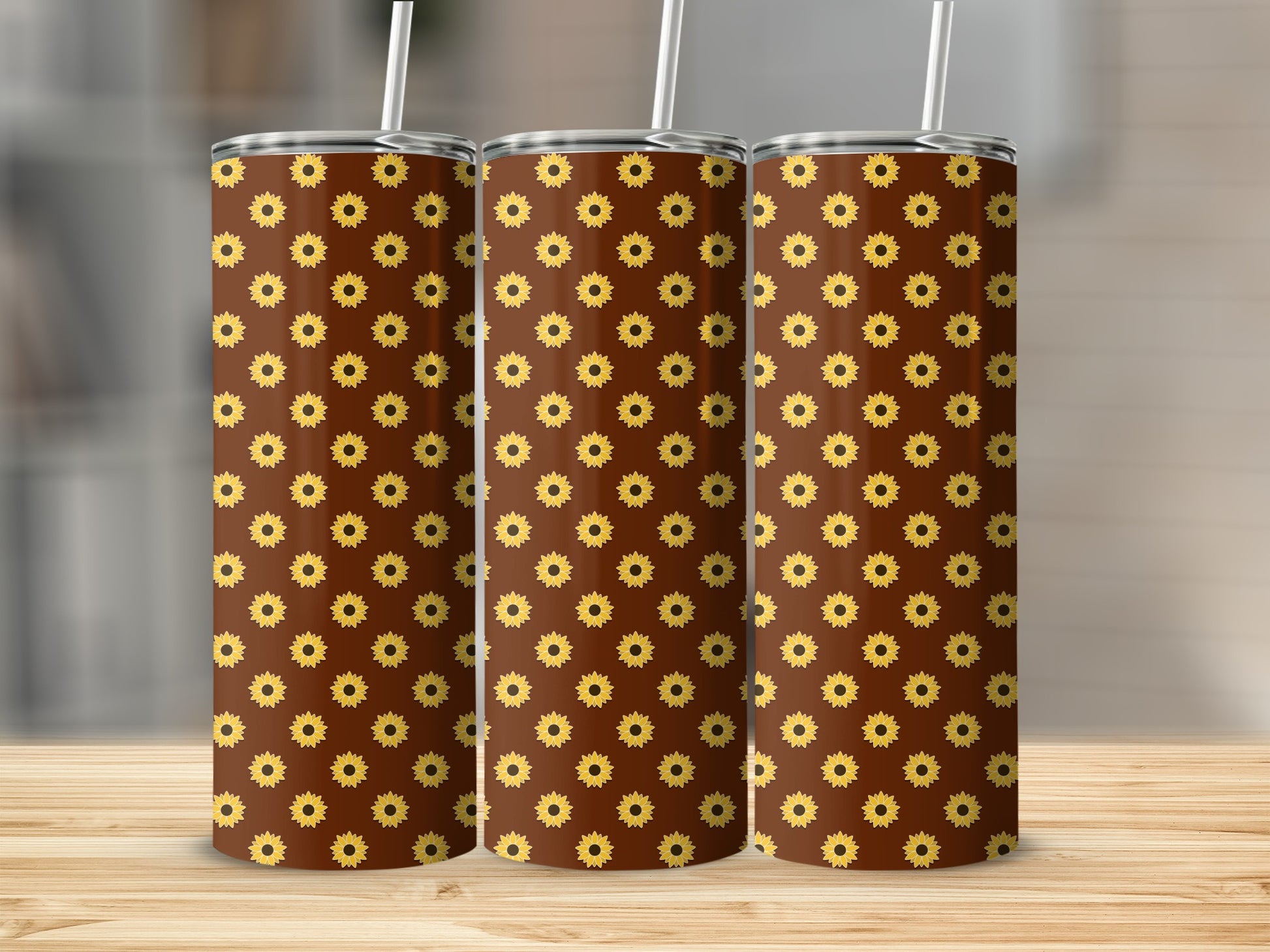 Three tumblers with a brown background and a repeating pattern of yellow sunflowers.