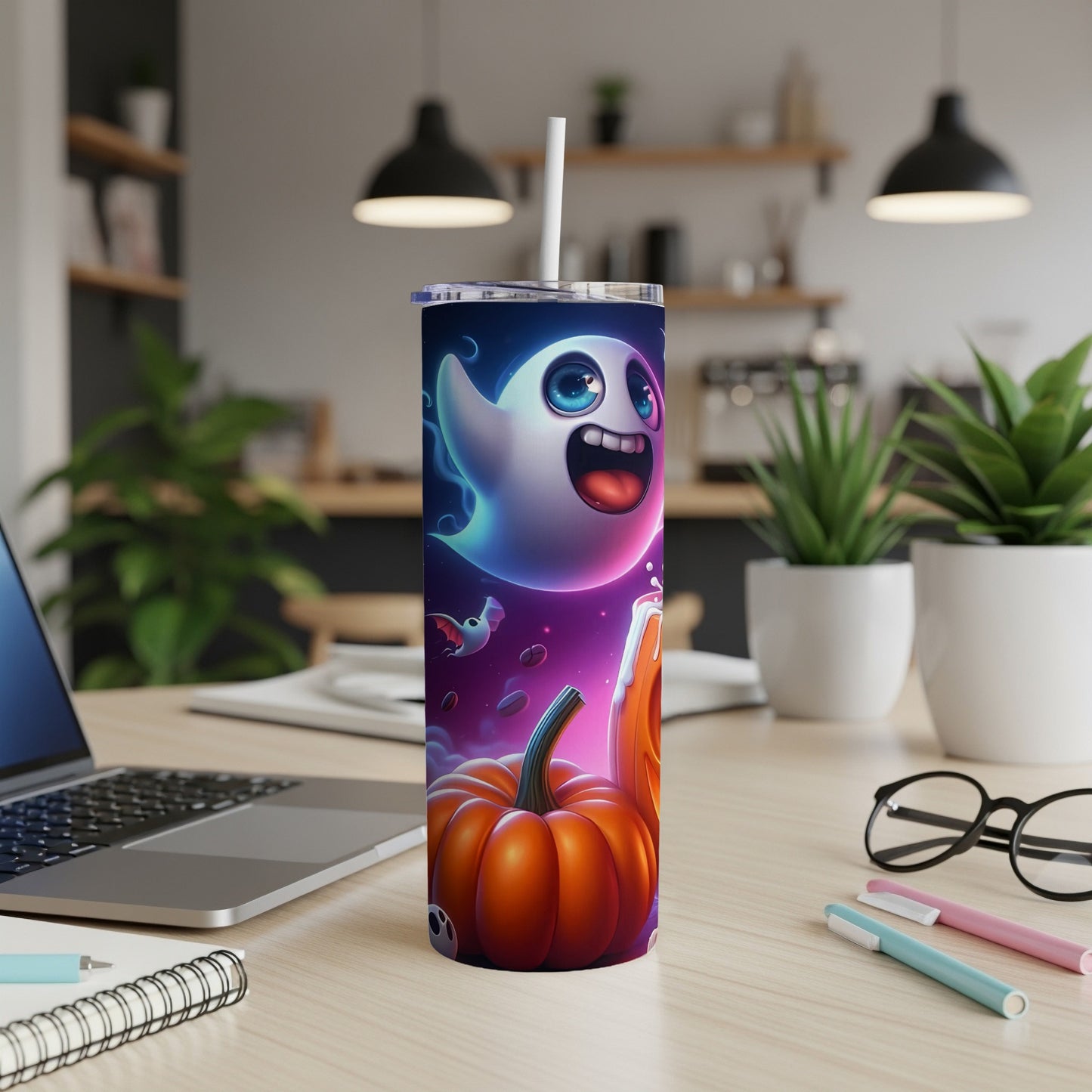 Halloween tumbler with a cartoon ghost and pumpkin design.
