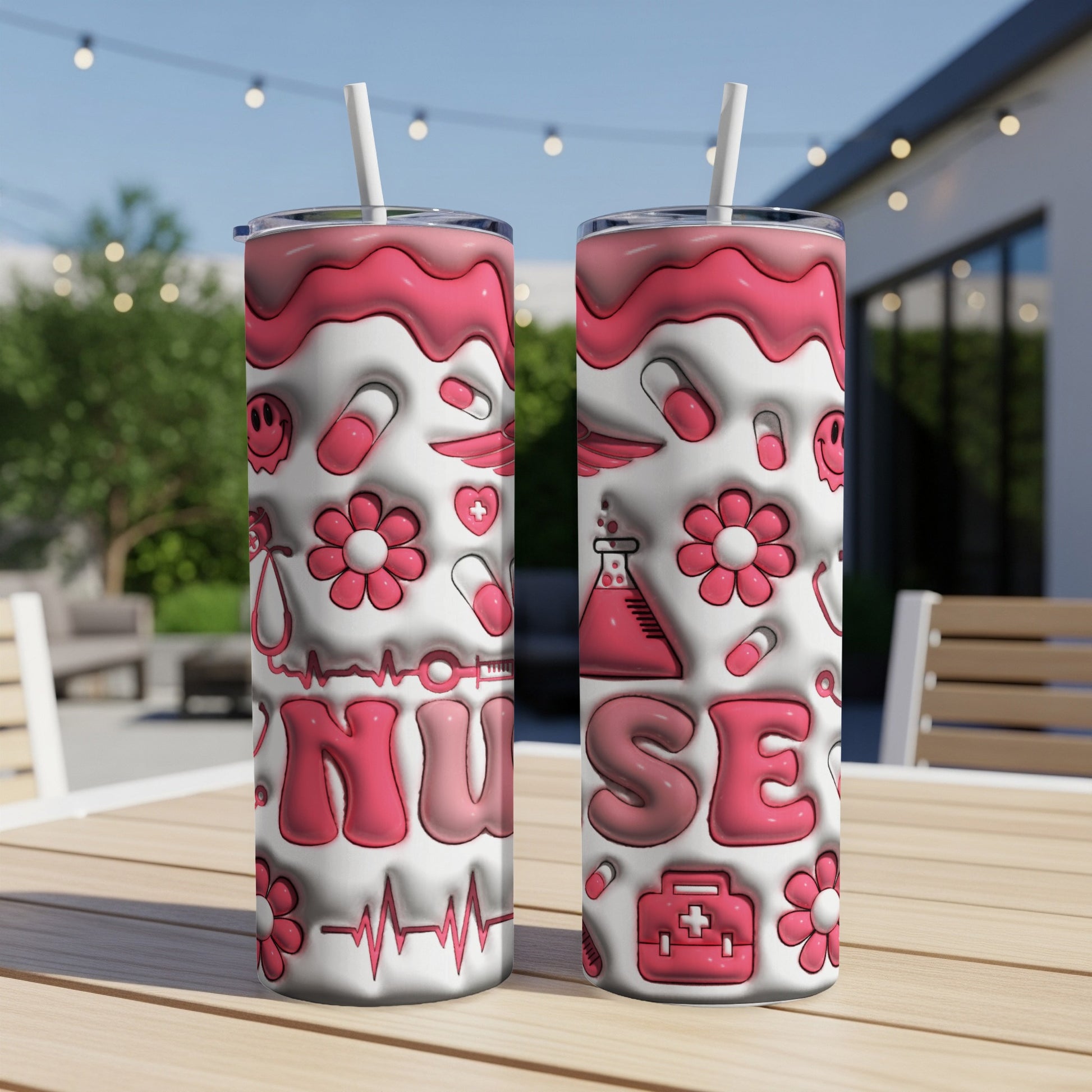 Pink tumbler with "NURSE" and medical/floral icons on a table outdoors.