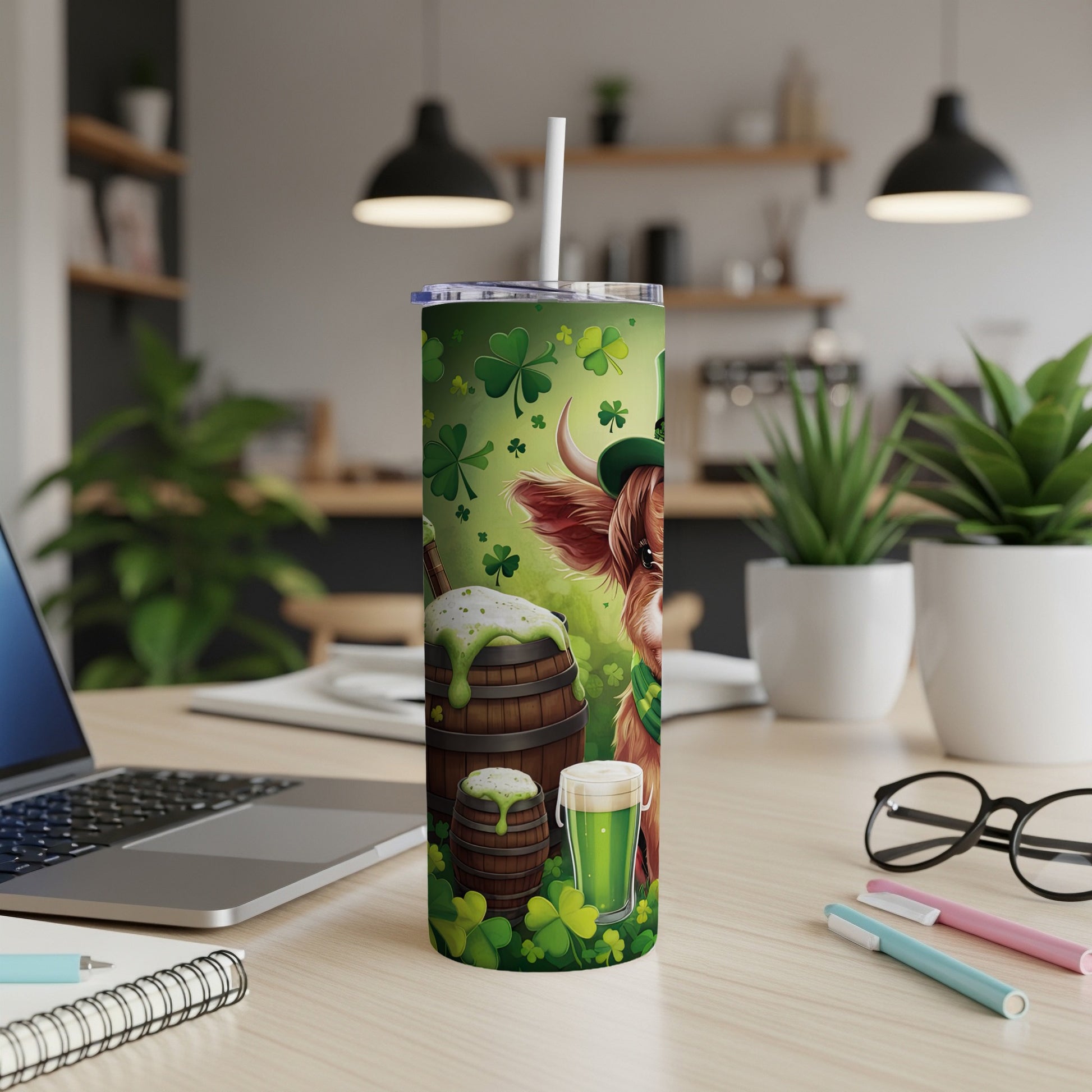 Highland cow with St. Patrick's Day clover and beer on a tumbler.
