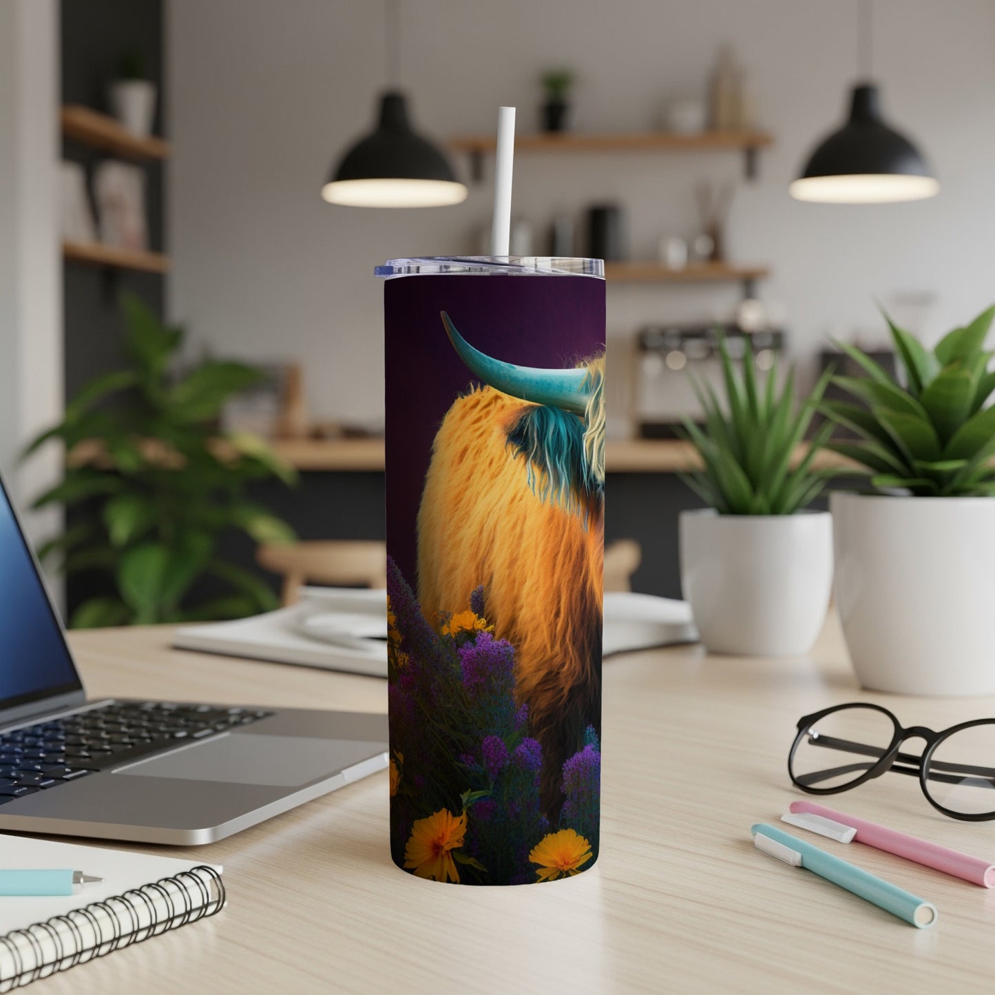 Highland cow with long fur and turquoise horns on a floral background.