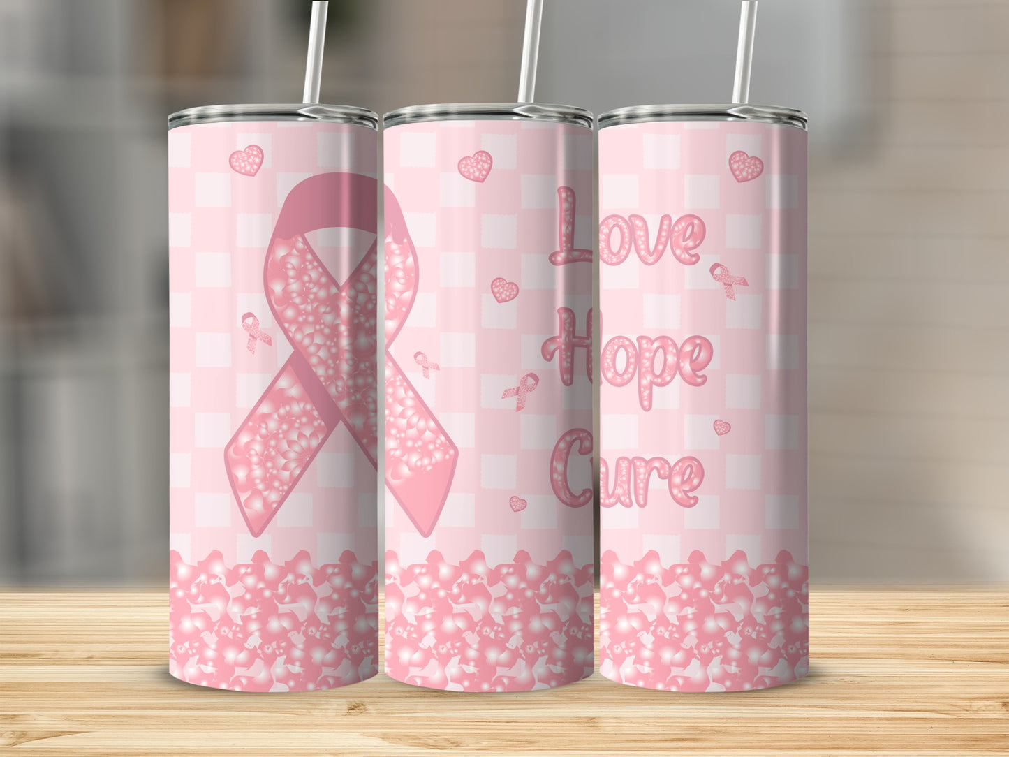 Pink ribbon tumbler with "Love Hope Cure" and plaid background.