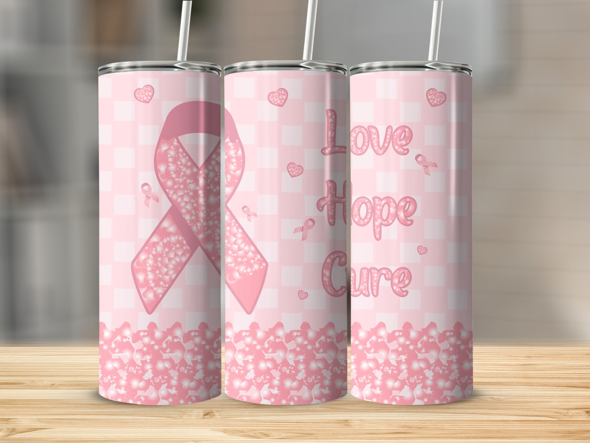 Pink ribbon tumbler with "Love Hope Cure" and plaid background.