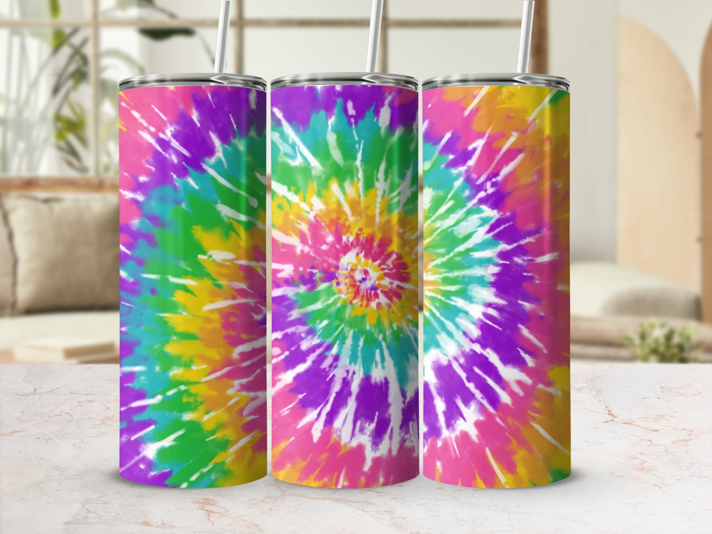 Three tie-dye tumblers with pink, yellow, green, and purple spiral design.