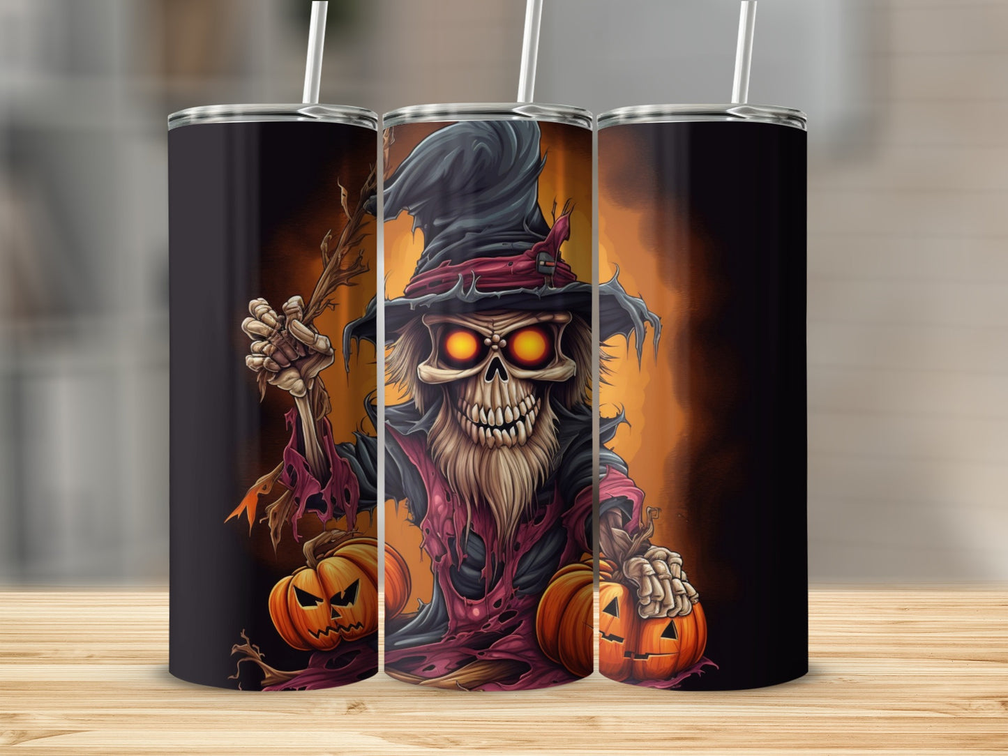 Three tumblers featuring a spooky skeleton grim reaper with pumpkins.