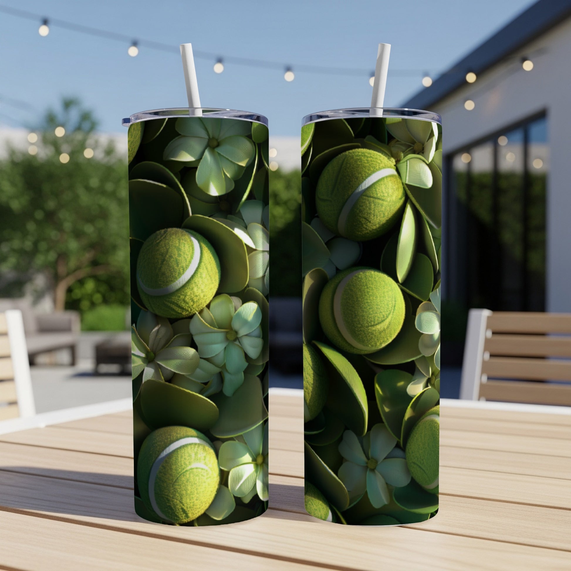 Two tumblers with a tennis ball and green leaf pattern.