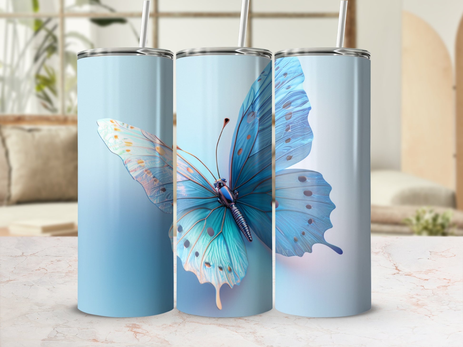 Blue butterfly design on a light blue gradient tumbler.