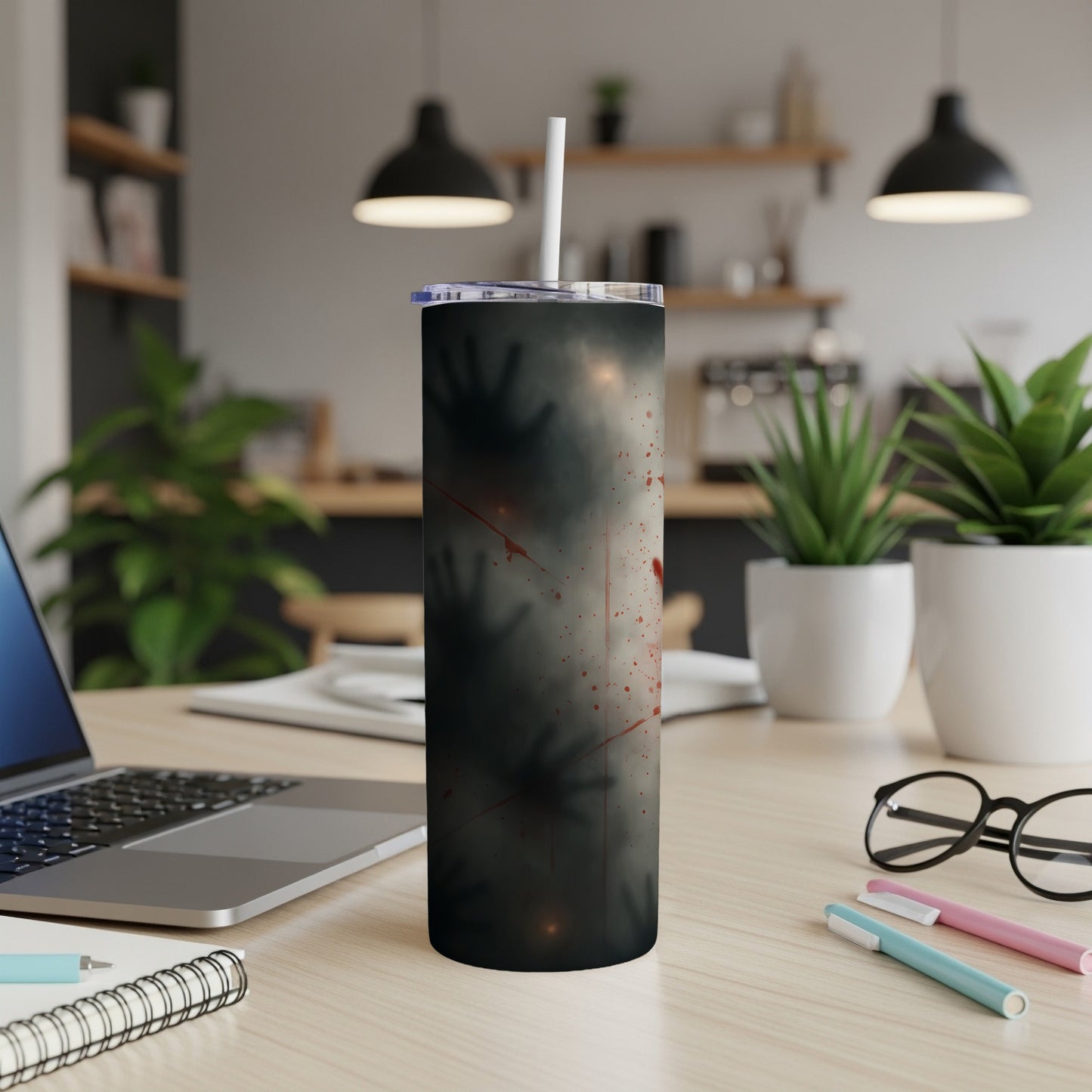 Tall tumbler with shadowy handprints and red splatters.