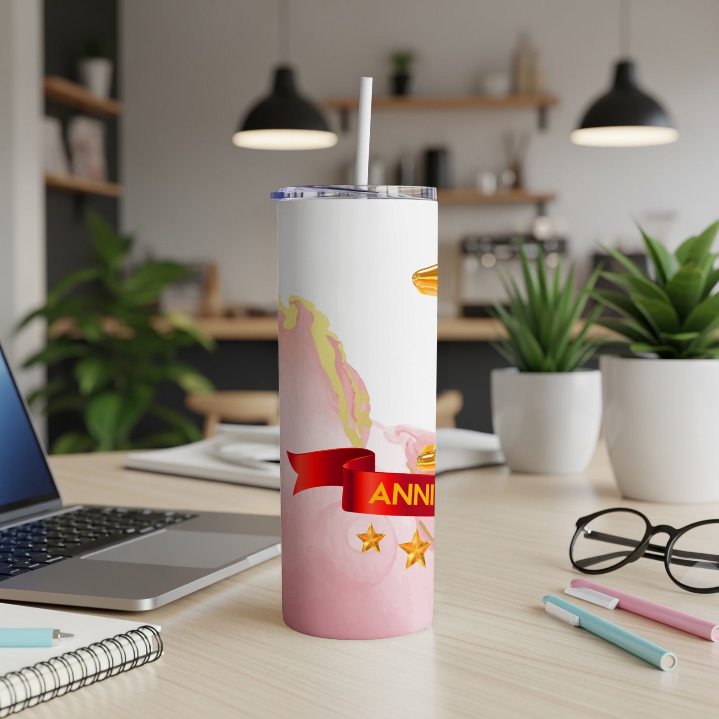 White tumbler with pink marble pattern and gold stars, "Anniversary" ribbon.