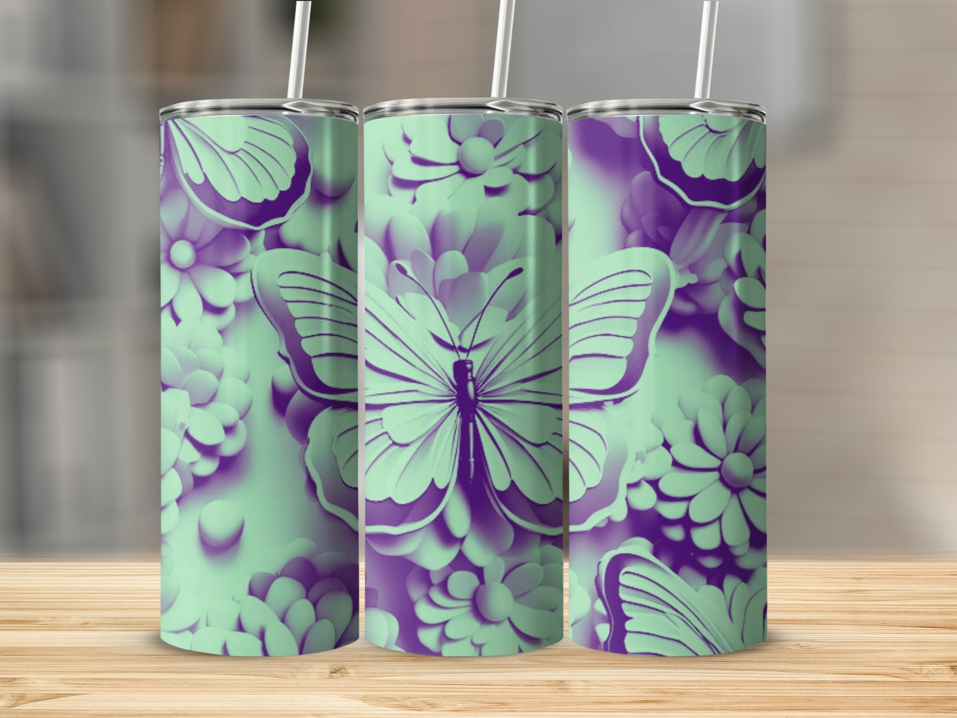 Triptych of mint green tumblers with purple butterfly and floral designs.