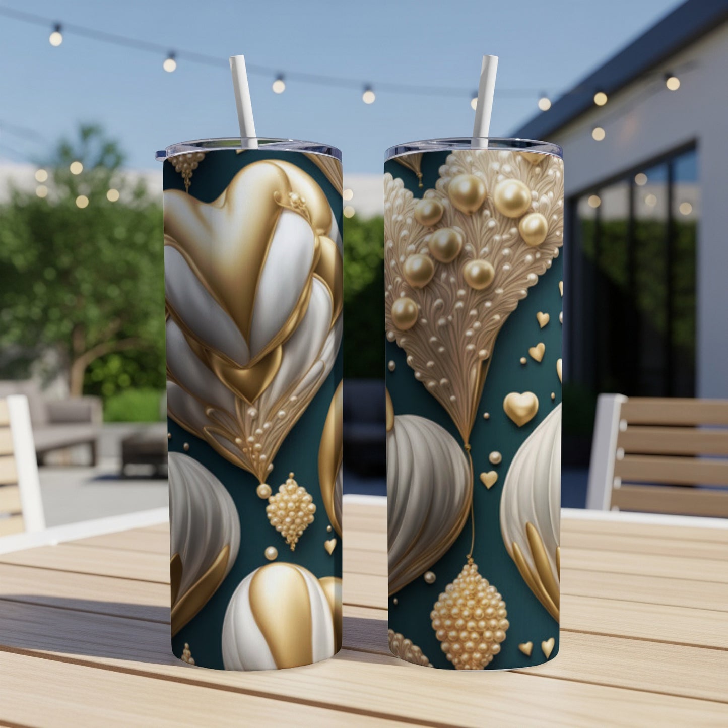Two tumblers with gold and white hearts and pearl-like beads on dark teal background.