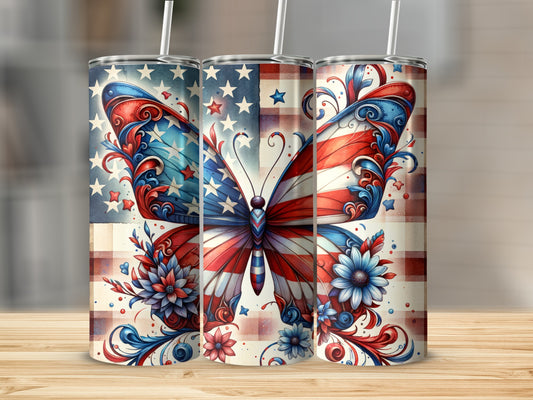 USA flag butterfly tumbler with floral accents on wood background.