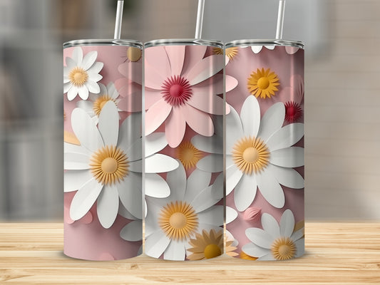Three 20 oz tumblers with pink and white daisy floral design on a pink background.