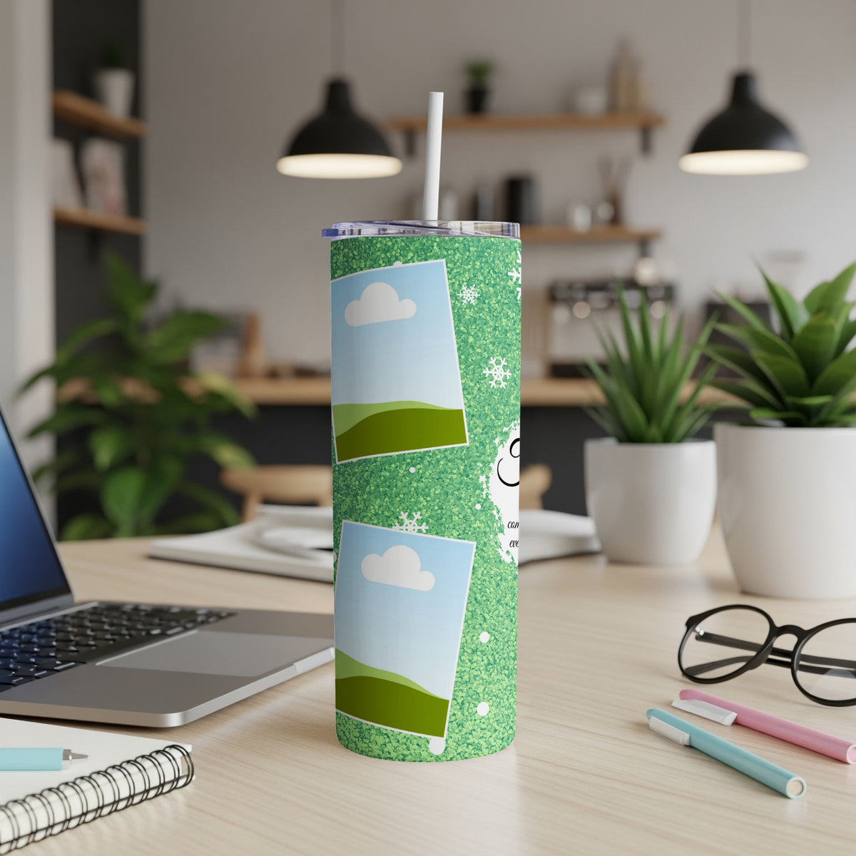 Green glitter tumbler with photo frames and snowflakes, with a straw.