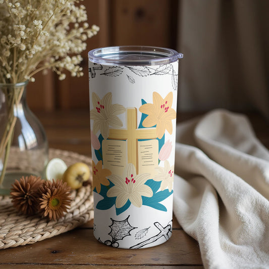 Decorative tumbler with floral and cross design