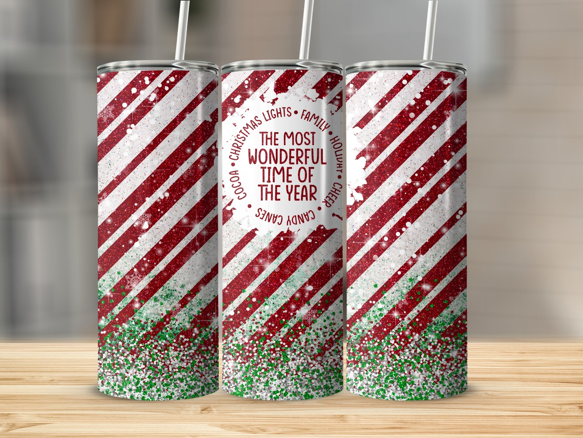 Candy canes and glitter design on three tumblers with text "Most Wonderful Time of Year".