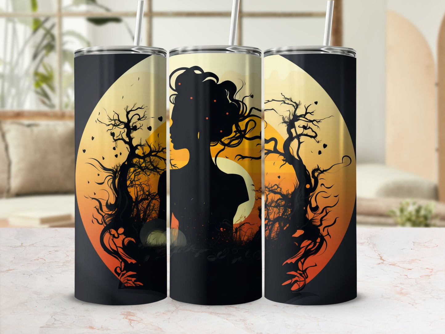 Three tumblers with a silhouette of a woman's head against a circular Halloween design.