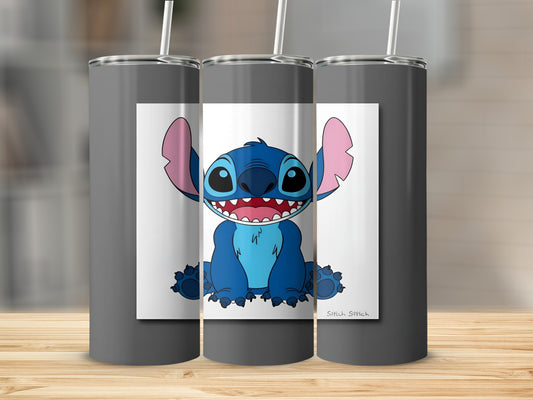 Cartoon Stitch character sitting with wide smile.