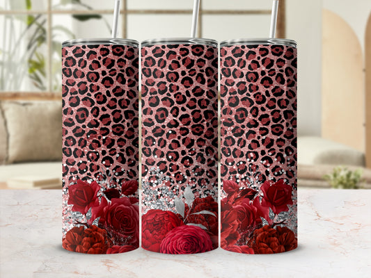 Pink leopard print tumbler with red roses and glitter accents.