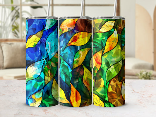 Three tumblers with stained glass leaf pattern in blues, greens, and oranges.
