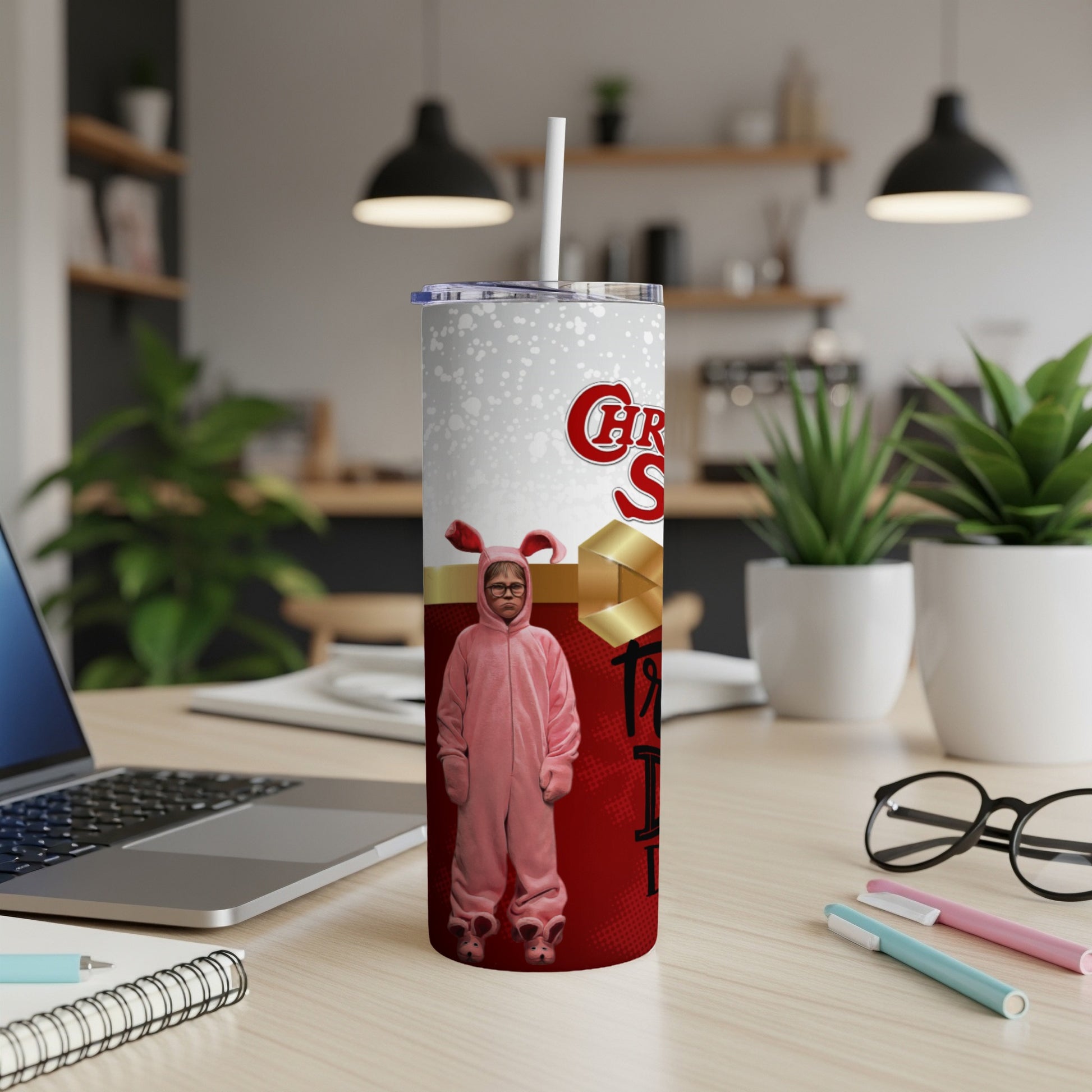 Christmas Story bunny suit character on a tumbler with lid and straw.