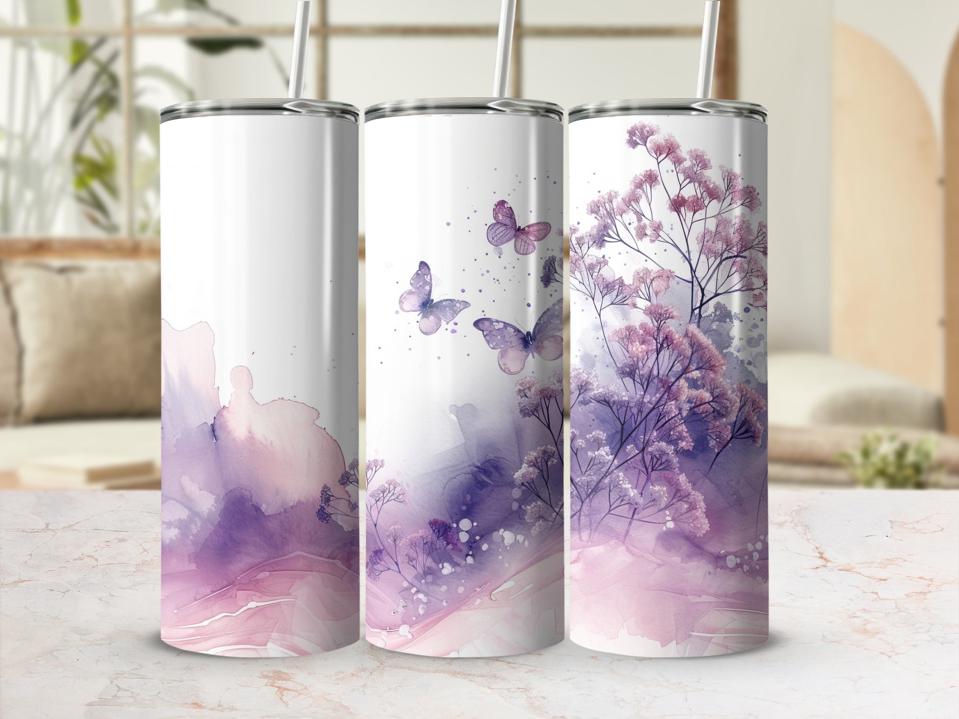 Three tumblers with a purple watercolor floral and butterfly design.
