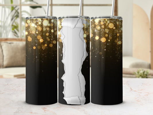 Black tumbler with torn paper texture and sparkling golden bokeh background.