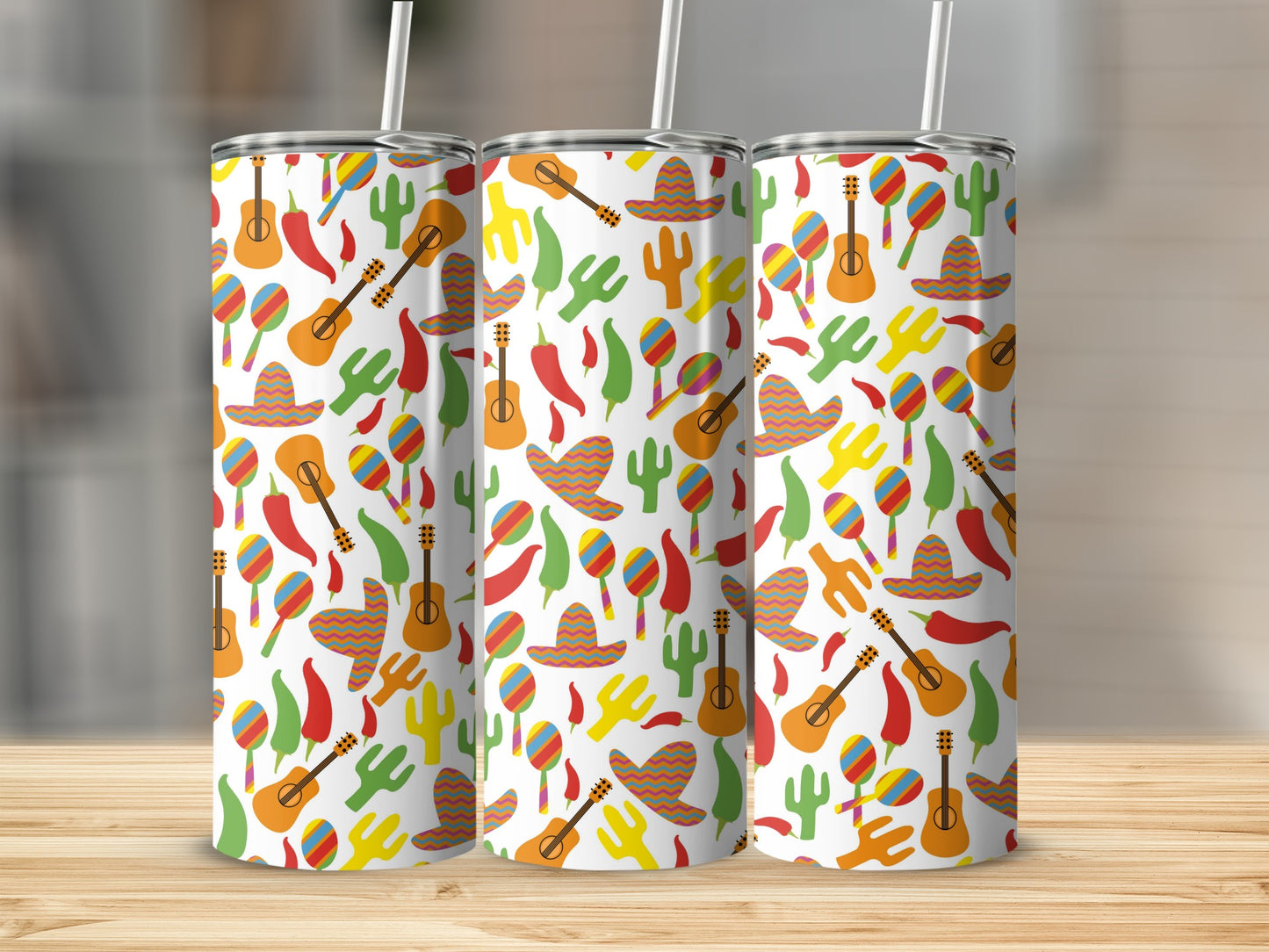 Three tumblers with a pattern of guitars, sombreros, maracas, cacti, and peppers.