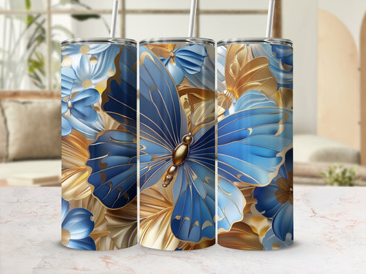 Three tumblers with blue butterflies and gold floral designs.