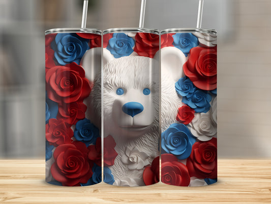 White bear surrounded by red and blue roses on a tumbler.