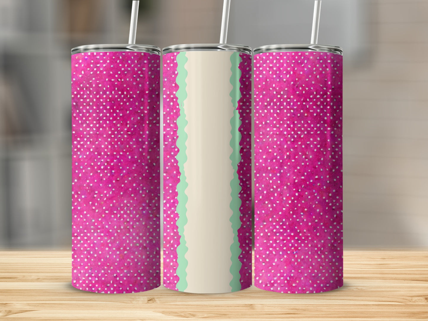 Three tumblers with pink polka dots and a mint green wavy stripe.