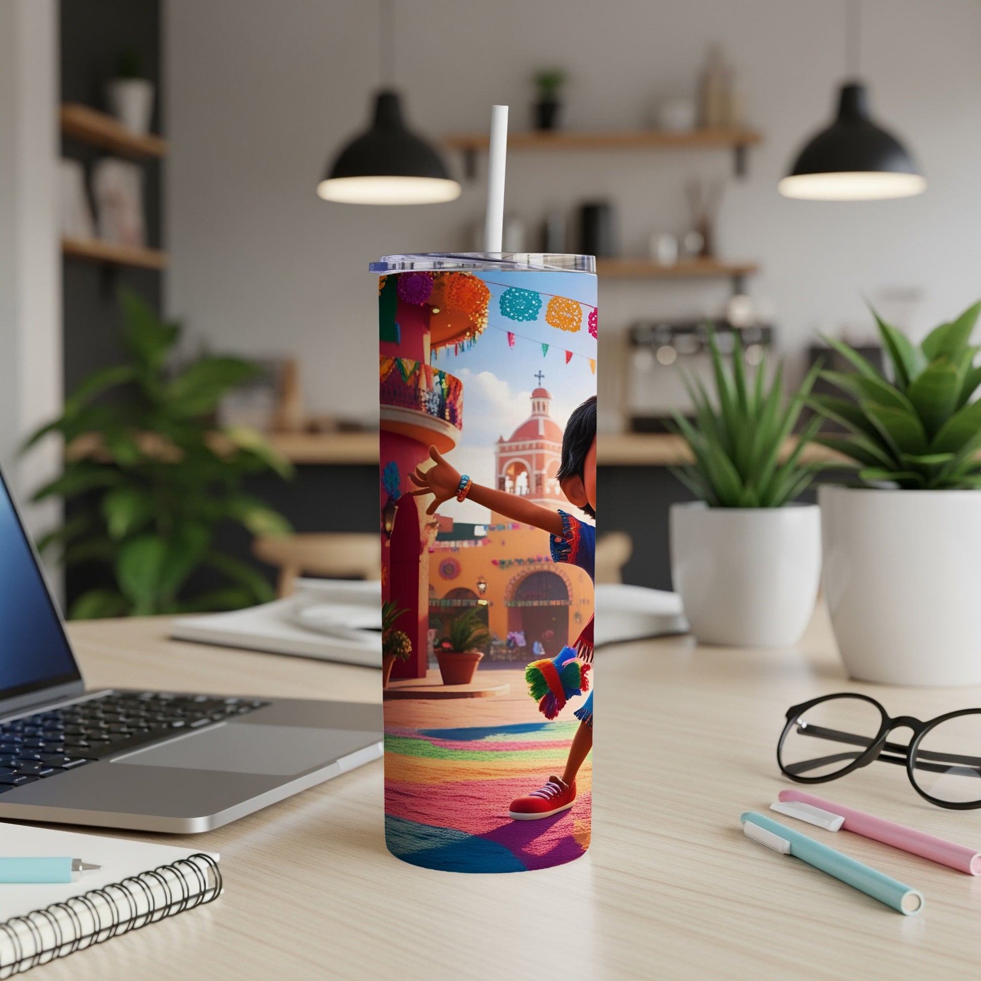 Colorful tumbler with cartoon girl and festive decor on a desk.