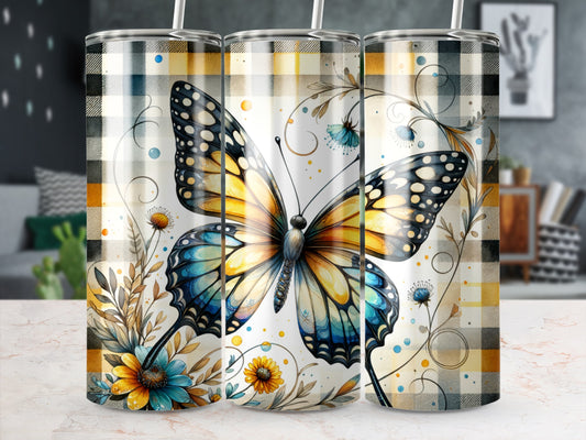 Butterfly with floral accents on a plaid background tumbler.