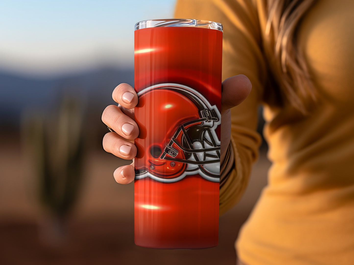Browns Helmet Against Orange Background Cleveland Tumblers