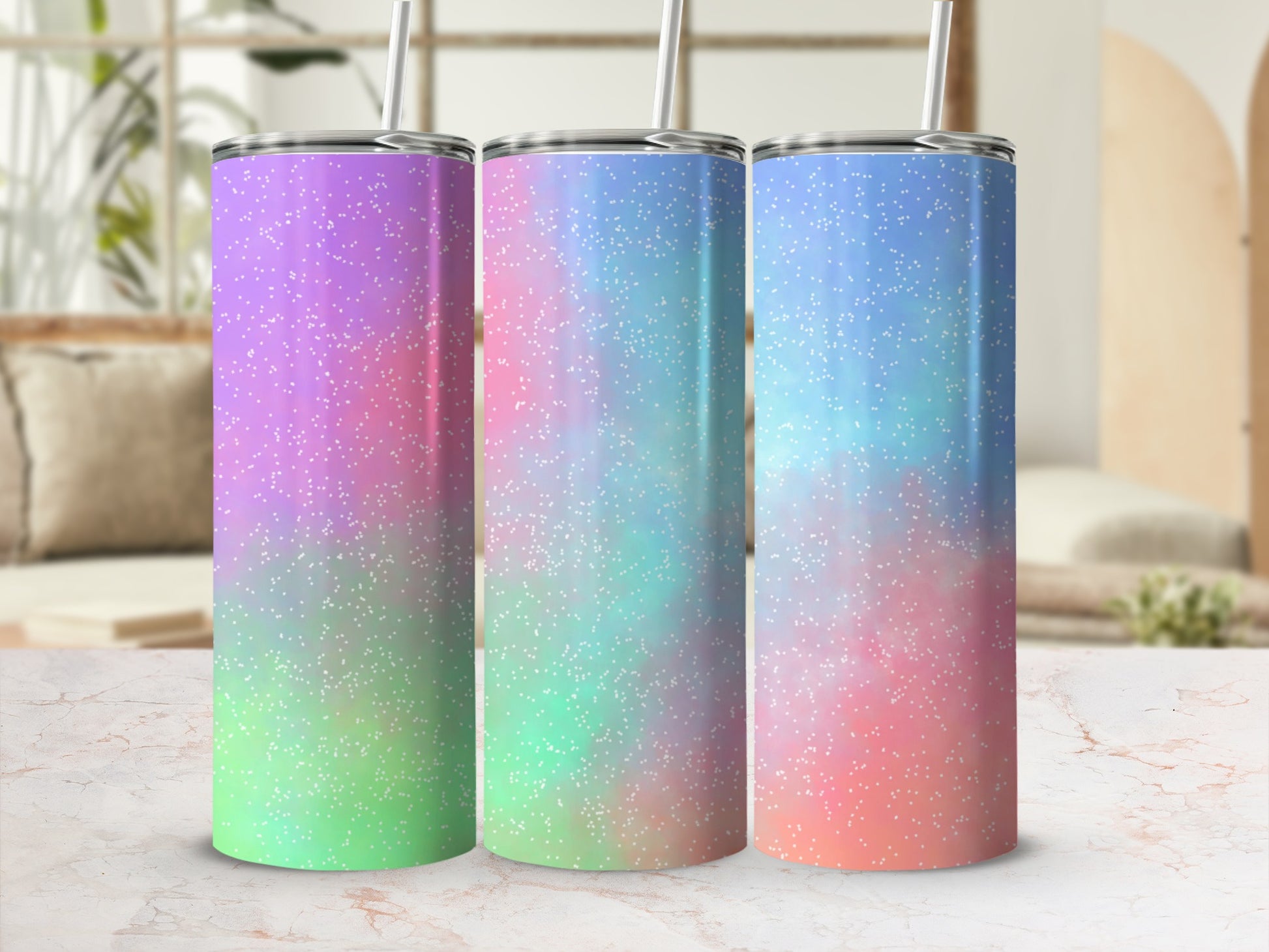 Three glitter tumblers with purple, blue, and pink color gradients.