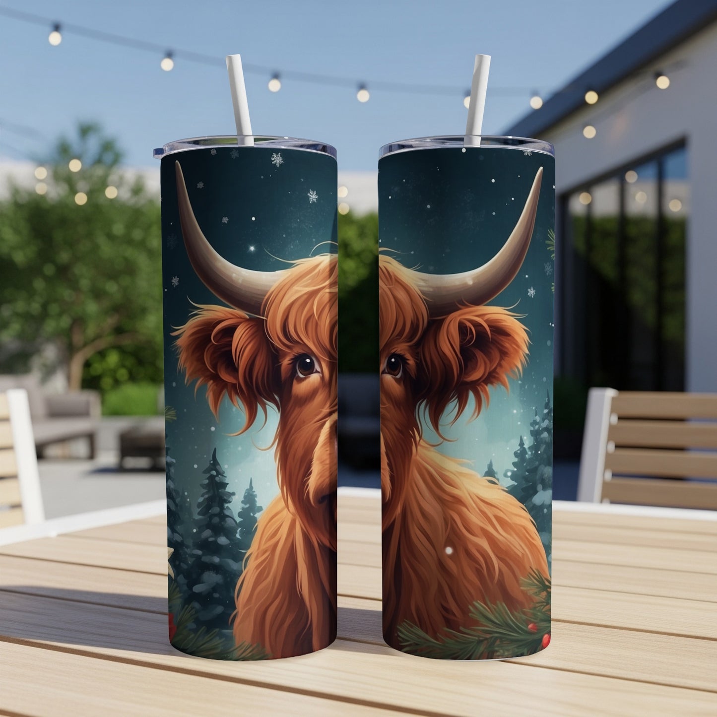 Highland cow with snowflake pattern on a Christmas-themed tumbler.