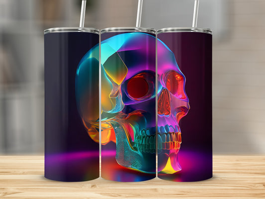 Three colorful, translucent skull tumblers with straws on a wooden surface.