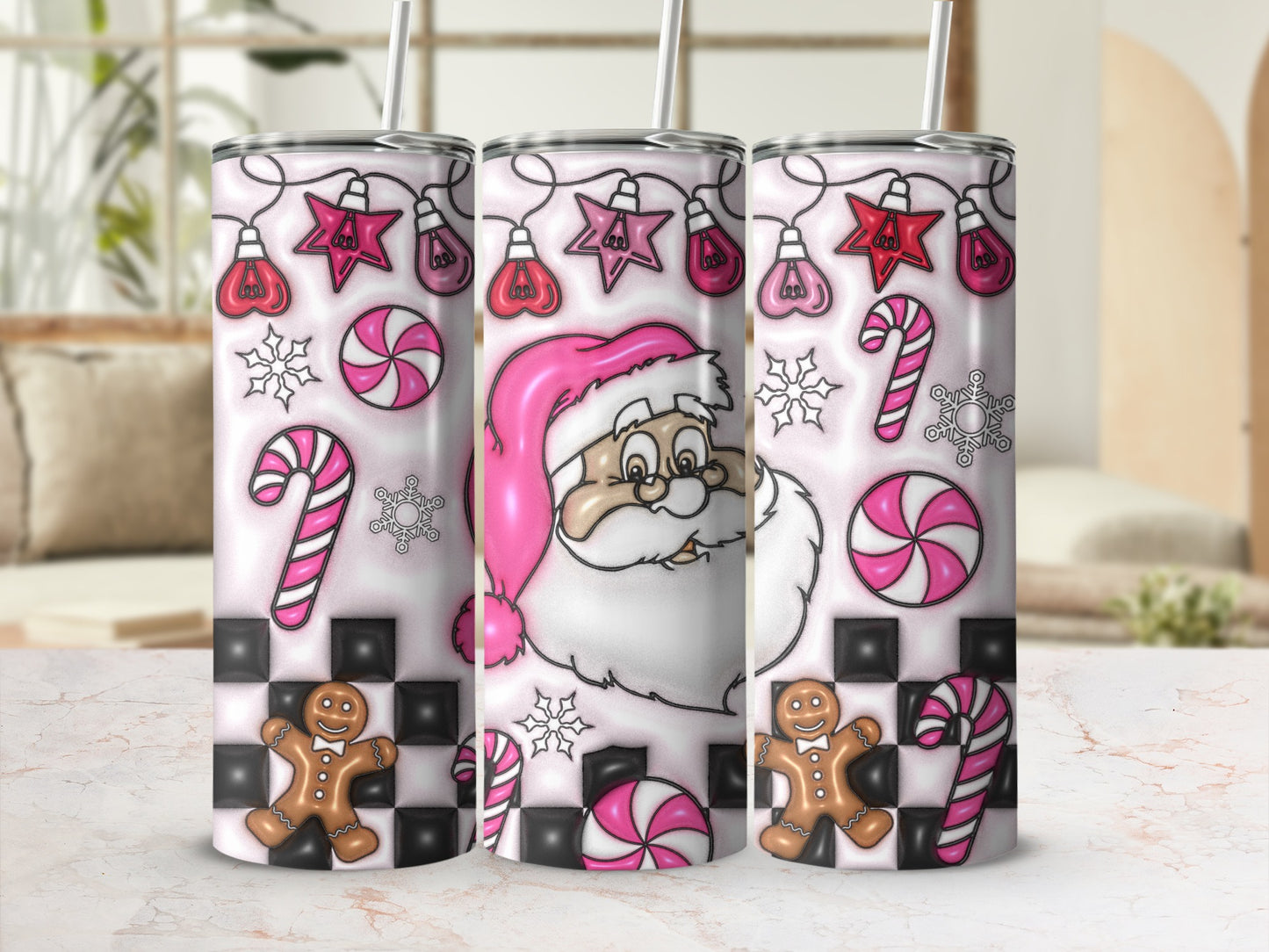 Three Santa Claus and Christmas themed tumblers with gingerbread, candy canes, and lights.