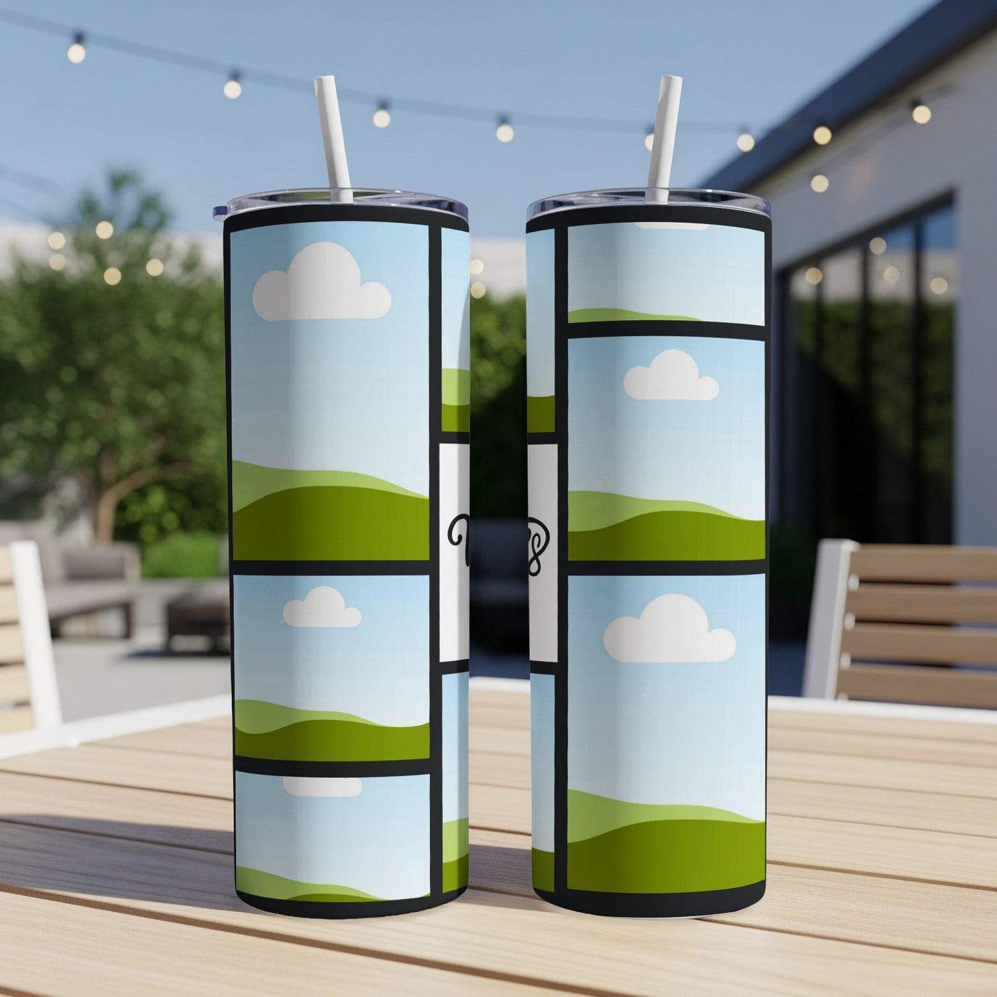 Two tumblers with a collage of cartoon clouds and rolling green hills on a table.