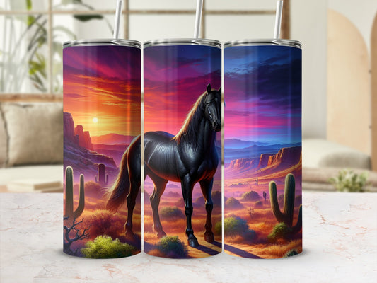 Black horse stands in desert landscape at sunset on stainless steel tumbler.